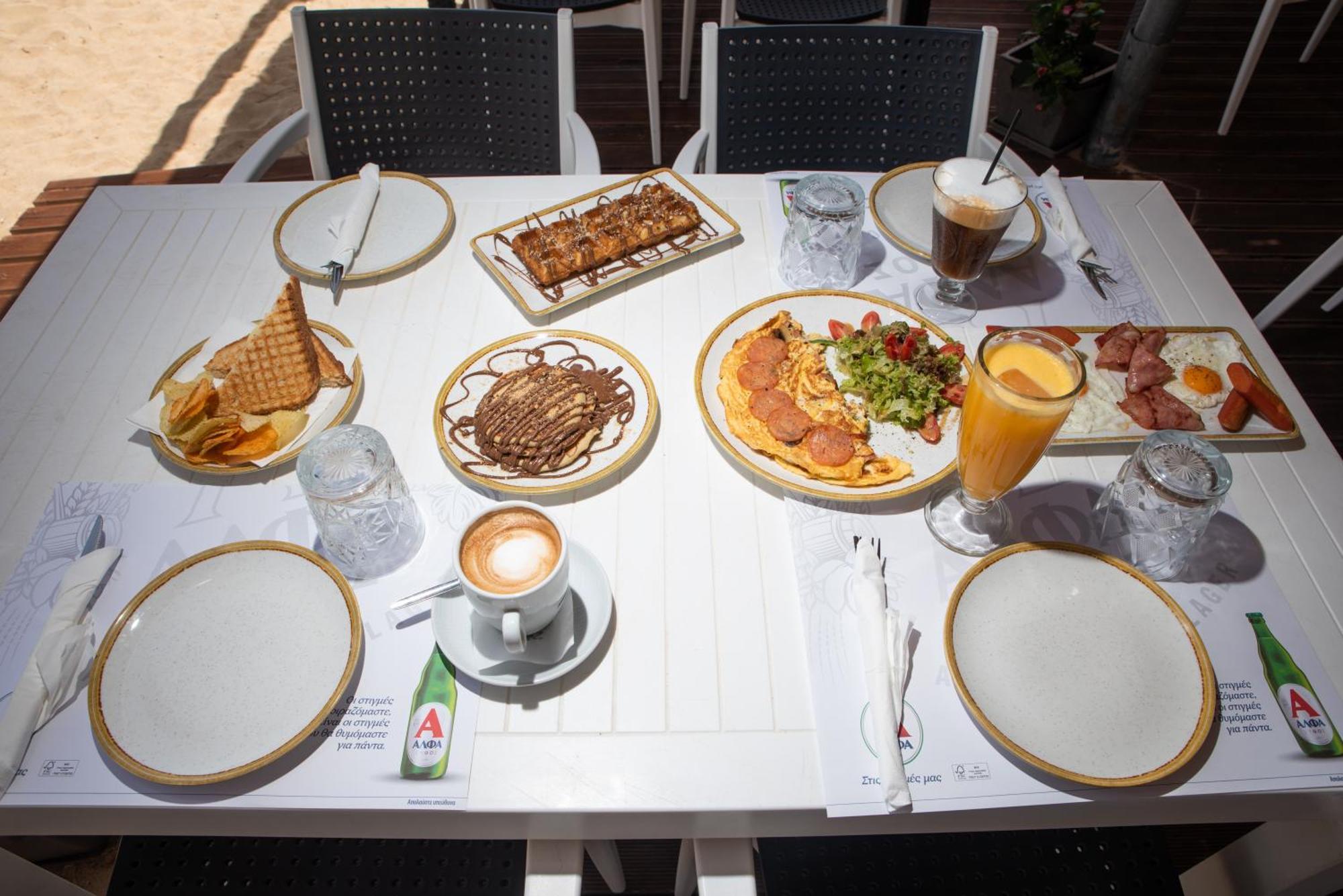 Coralli Rooms & Restaurant เอลาฟอนนิซอส ภายนอก รูปภาพ